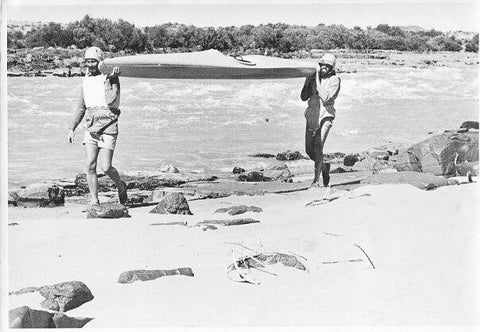 His father, Graeme Addison, in about 1975 on one of their first expeditions, portaging "unrunable rapids"