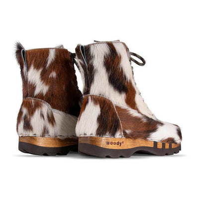 clogs herren pascal fell stiefel. fellschuh, fellstiefel, fellclog, kuhfell clogs, fellclogs. woody holzschuhe fell stiefel. kuhfell schuhe, fell clogs, woody kuhfell schuhe, fell kuhclogs kaufen. fellschuhe, holzschuhe, holzclogs fell kaufen.