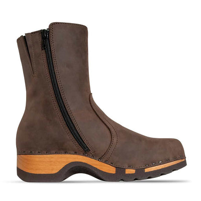 clogs damen veronika woody holzschuhe. veronika ankle boots mit zip, damenstiefel reissverschluss, stiefel, damenclogs mit flexibler, biegsamer holzsohle. holzclogs, clogs damen knöchel stiefel, damen clogs mit fussbett. ankleboots holz schuhe, holzclog, holzschuhe bestellen.