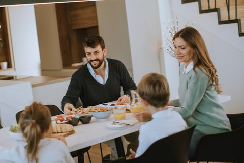 family having breakfast together