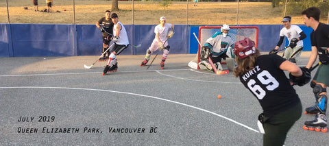 How to Organize Outdoor Roller Hockey Games a photo of players and a goalie and queen elizabeth park in vancouver bc canada