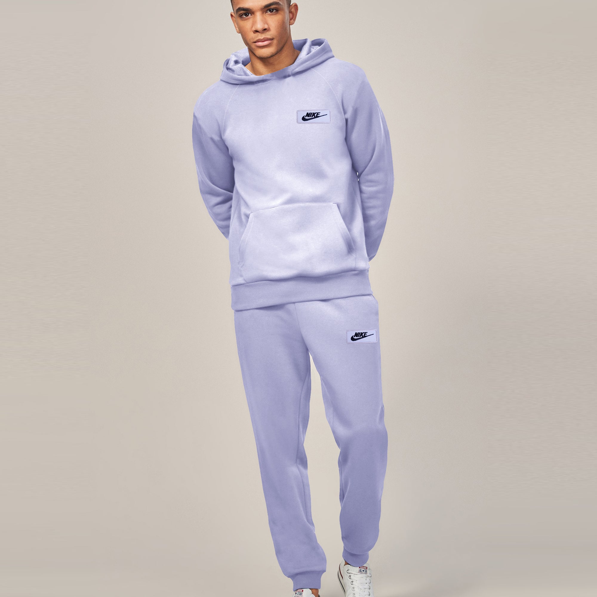 purple nike jogging suit