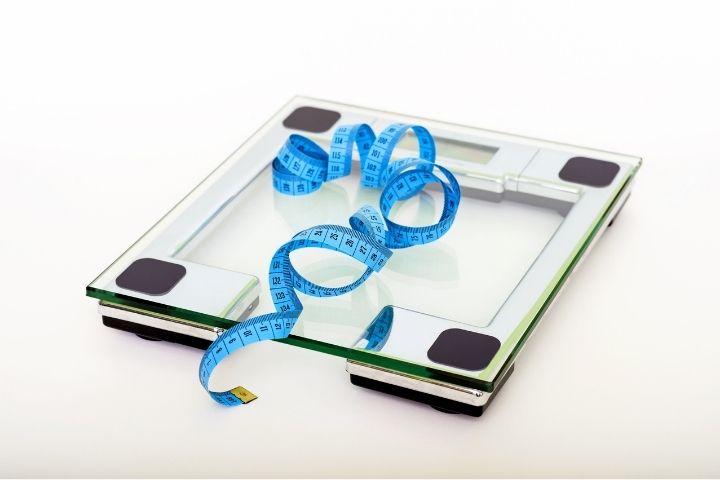 Blue tape on a square measuring scale