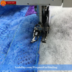 Prepare a quilt for binding