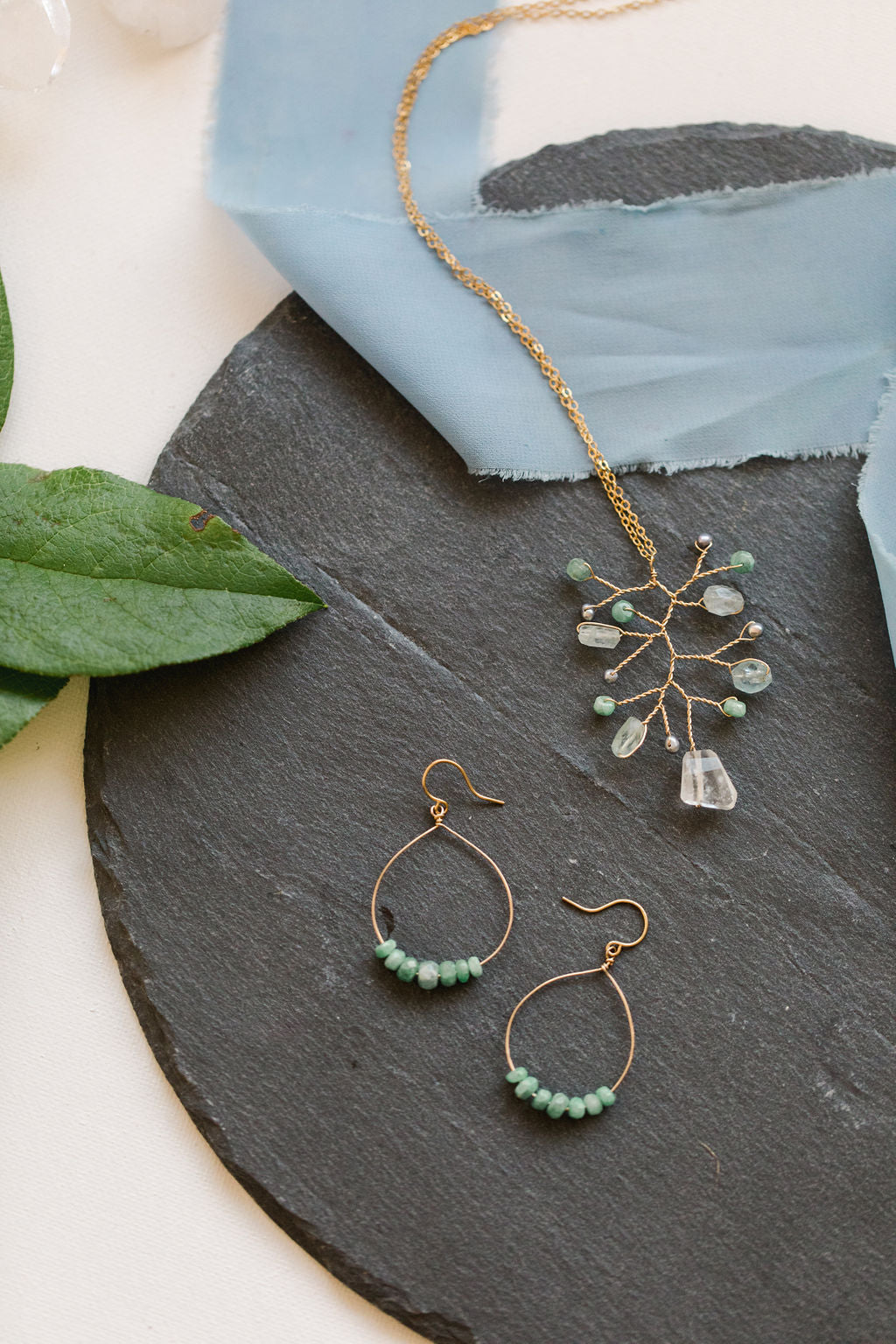 Gold Hoop Earrings with Emeralds