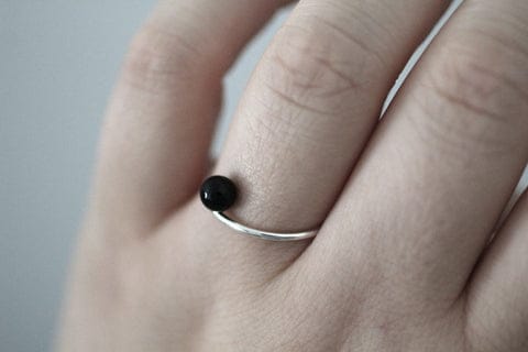 Positano mini ring in recycled silver by M of Copenhagen on model's hand