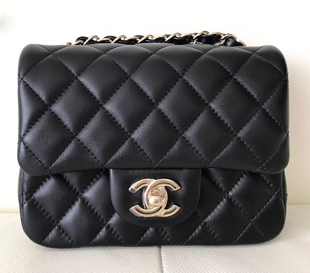 chanel black quilted clutch