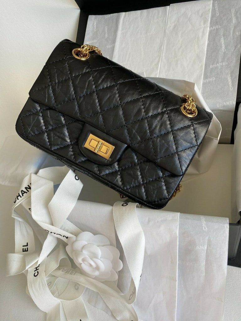 Chanel Black Quilted Aged Calfskin Mirror Charm Imitation Pearl Chain 255  Reissue East West Double Flap Gold Hardware 2006 Available For Immediate  Sale At Sothebys