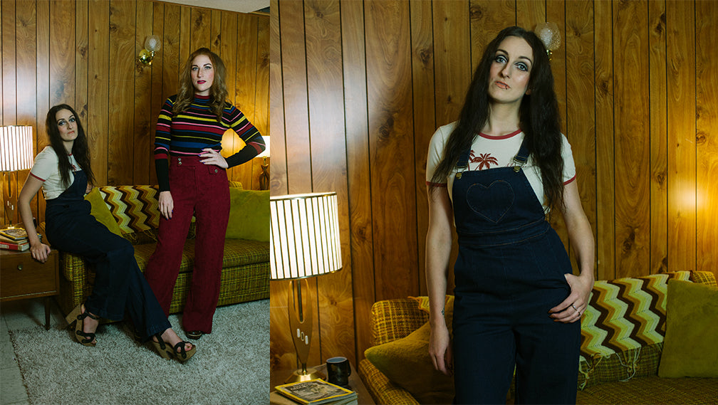 drvaleriemraymondny 1970s fashion Voodoo Vixen Natalia Heart Overalls, Meow-ii Tee, Corduroy Pants in Burgundy, and Knit Sweater in black and multi stripe