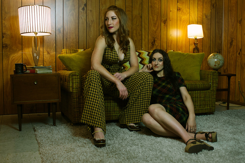 drvaleriemraymondny 1970s Fashion women sitting on couch