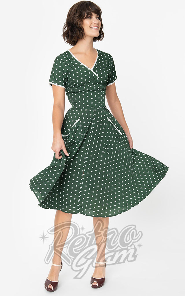 green dress with white polka dots