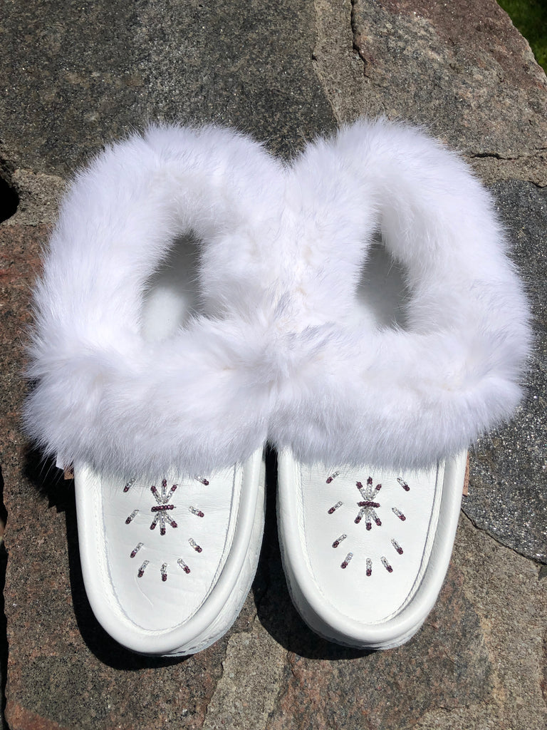 white leather moccasins