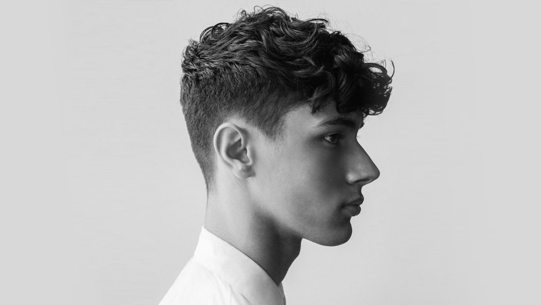 10. "Curly Hair for Men: A Complete Guide to Styling and Maintenance" - wide 2