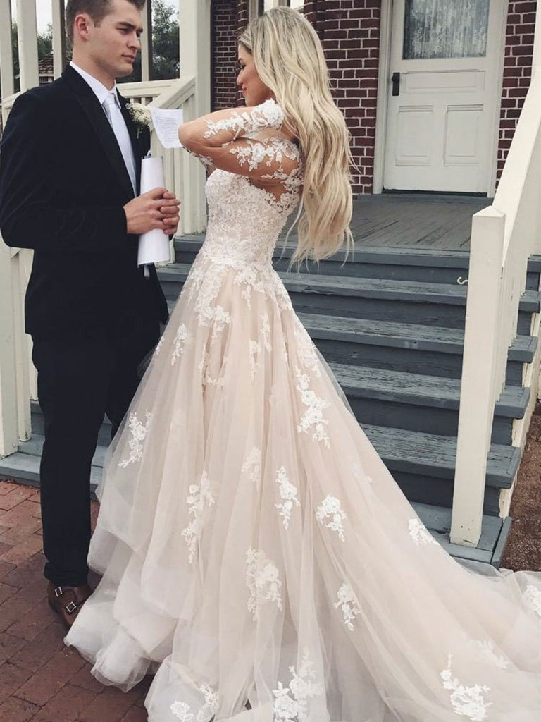 long sleeve champagne gown