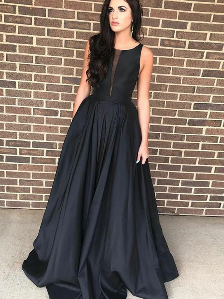 black floor length dress with sleeves