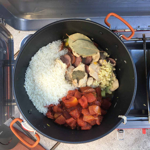 Broth, tomatoes, rice, garlic, bay leaf, thyme