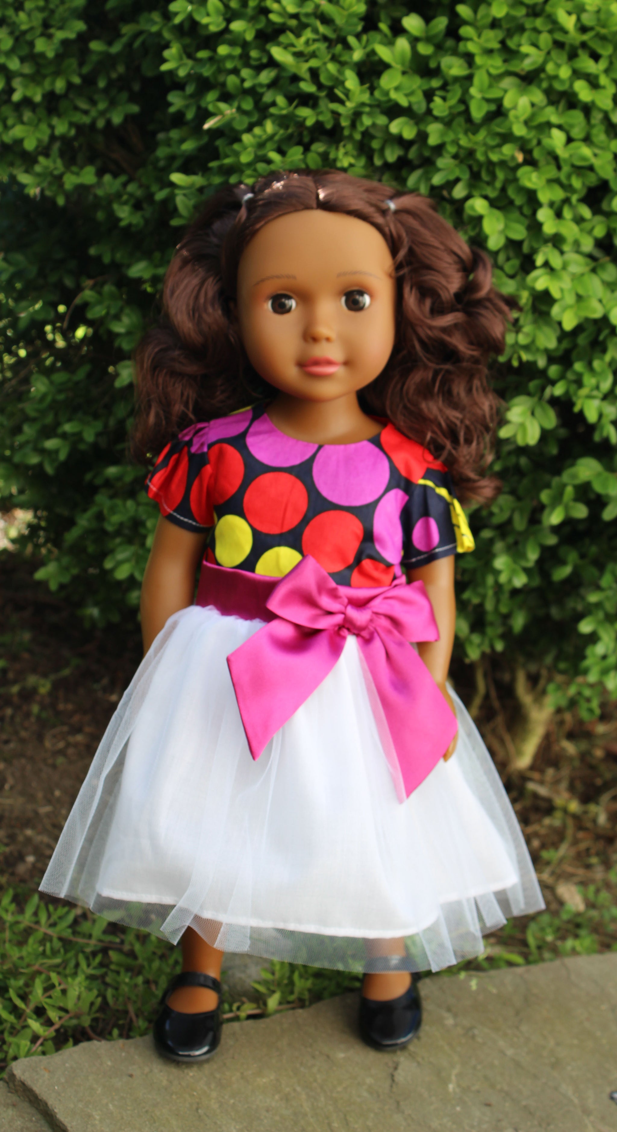 mixed baby doll with curly hair