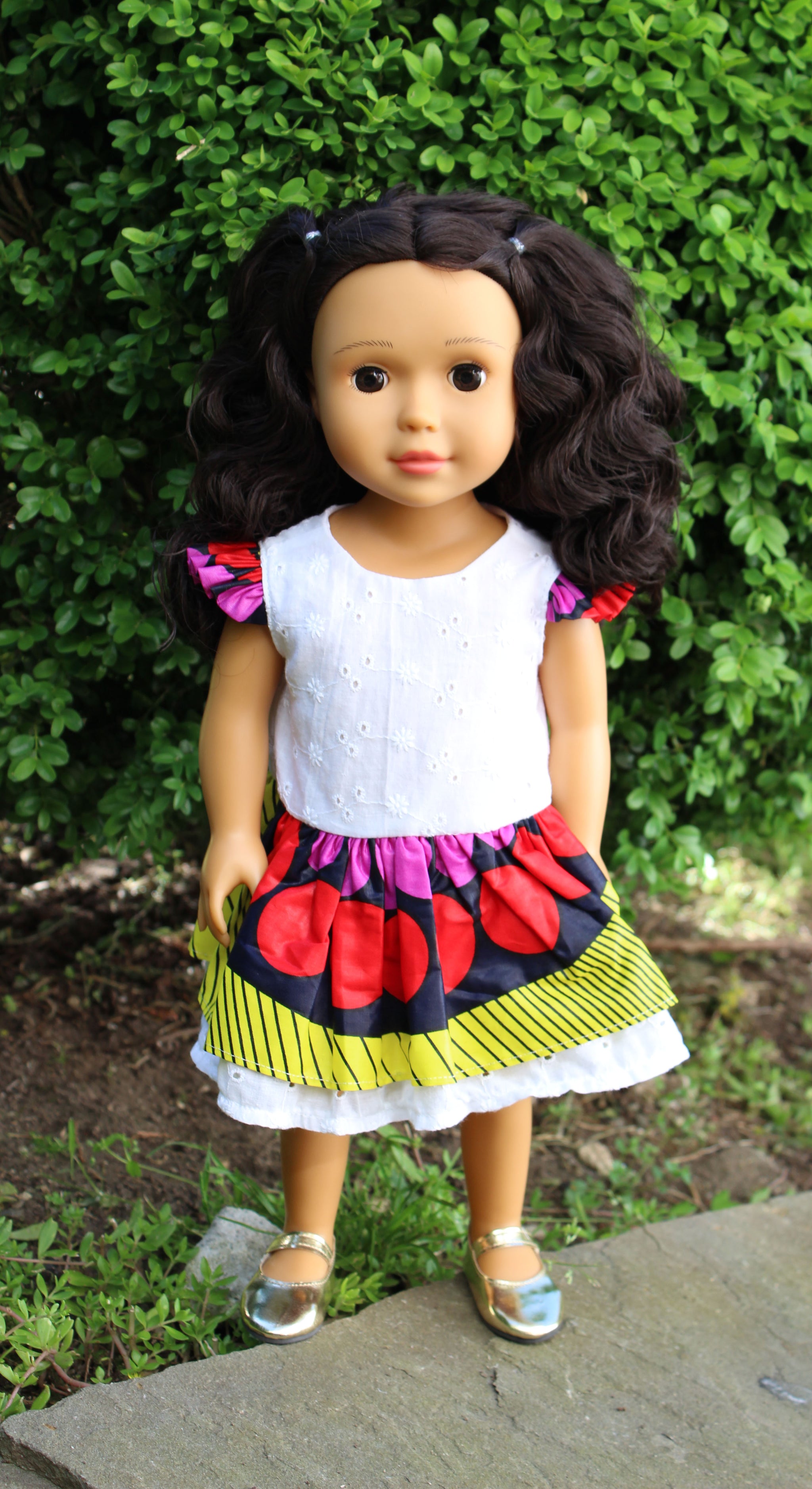 mixed baby doll with curly hair