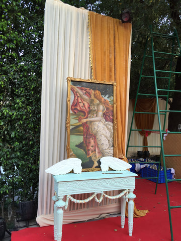 console with wreaths at gala event