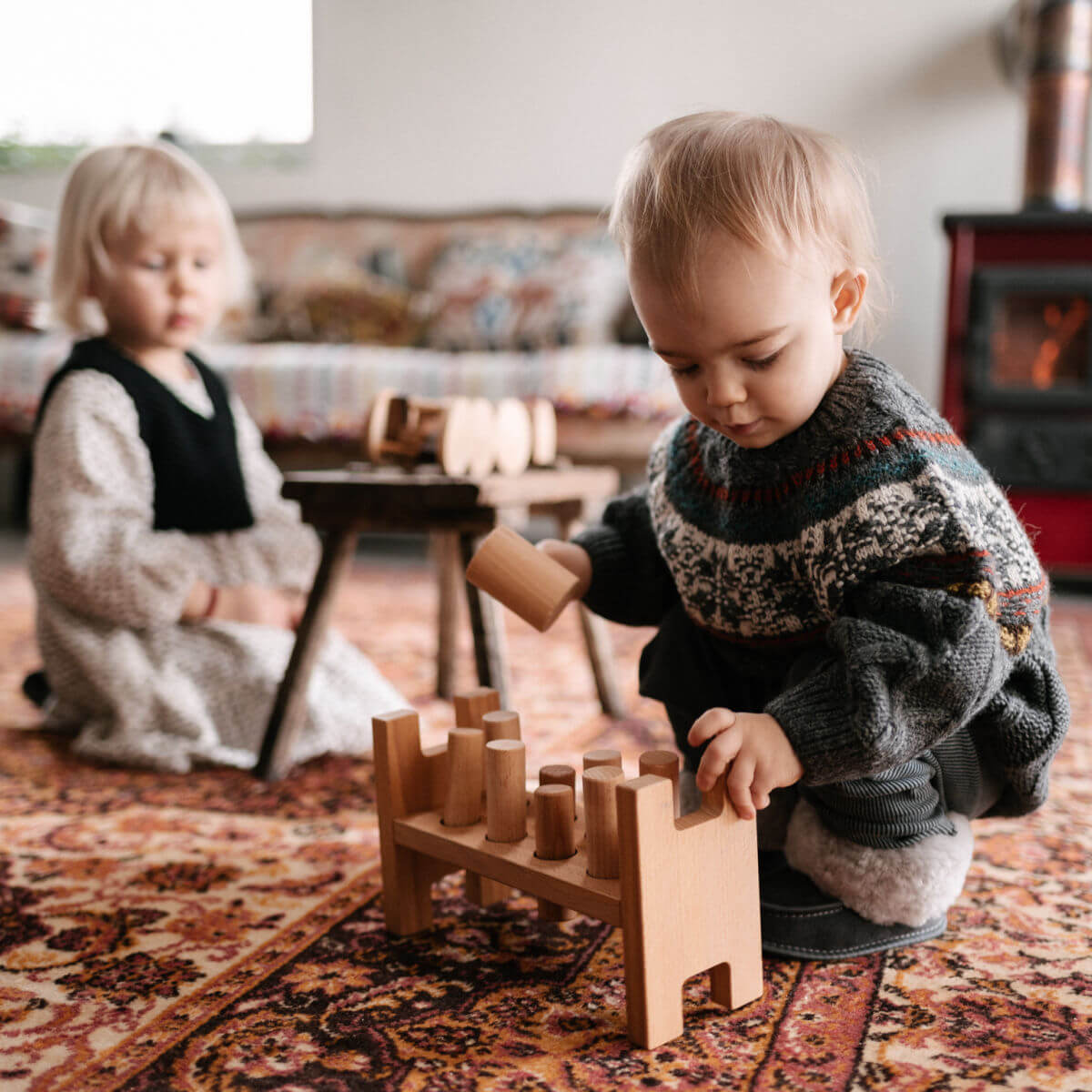pound a peg Montessori wooden toy by wooden story