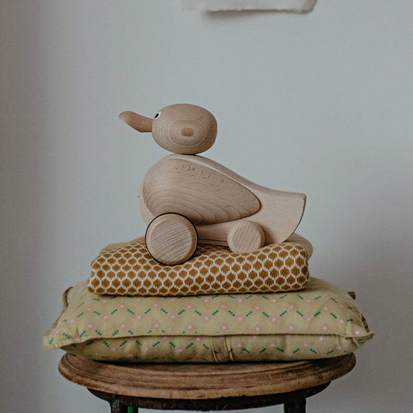 natural wooden toy pull along duck at blue brontide uk