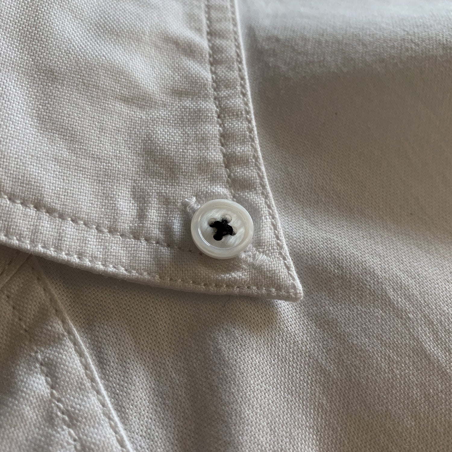 tightly sewn on buttons