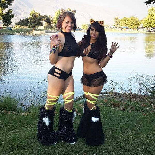 rave girls in matching black festival outfits