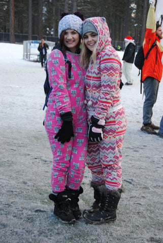 rave girls wearing pink onesies at snowglobe