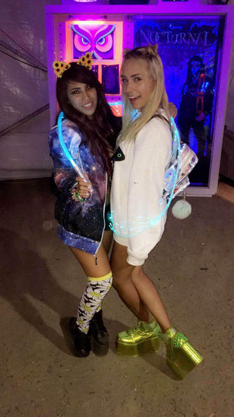 rave girls enjoying nocturnal wonderland together 