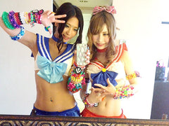  rave girls in matching cosplay outfits 