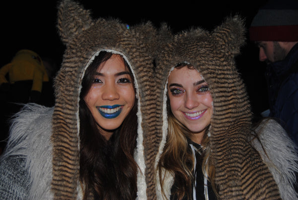 rave girls matching in brown furry hoods