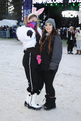 rave girls pose in the snow at snowglobe