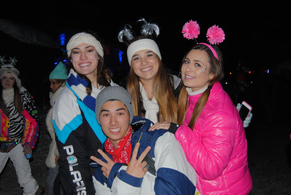 rave group enjoying night life at snowglobe