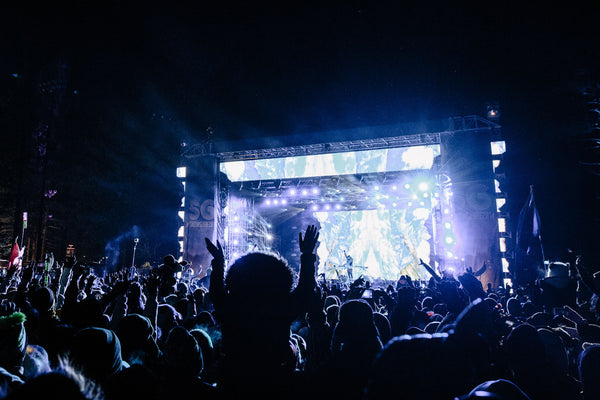 snowglobe lit up stage at night