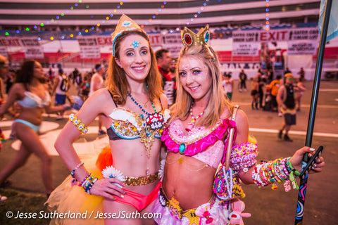 rave girls matching in pink princess festival outfits 