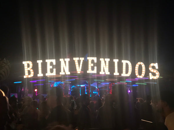 Bienvenidos Sign at Night at Deja Voom Festival