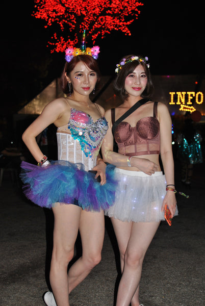 rave girls wearing matching tutus