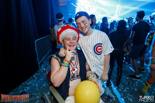 Raver Dressed up as a Mushroom in a Wheelchair at Freaknight Festival in Seattle, Washington