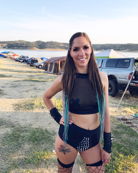 rave girl wearing all black savormeditation outfit