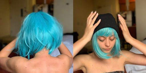 Placing a Neon Blue Wig on Your Head