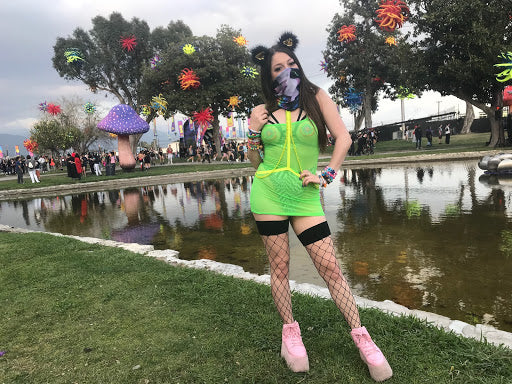 Raver Wearing Neon Green outfit with Rainbow Kitty Mask at Beyond Wonderland