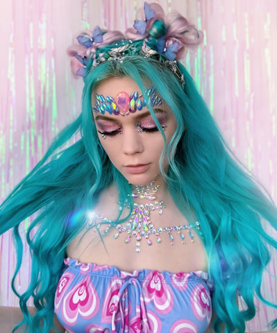 Raver with Turquoise Hair and Space Buns