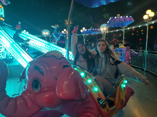 Ravers Riding the Flying Elephant Ride at Beyond Wonderland