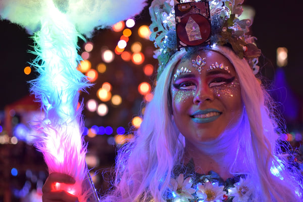 rave girl in sparkly blue makeup