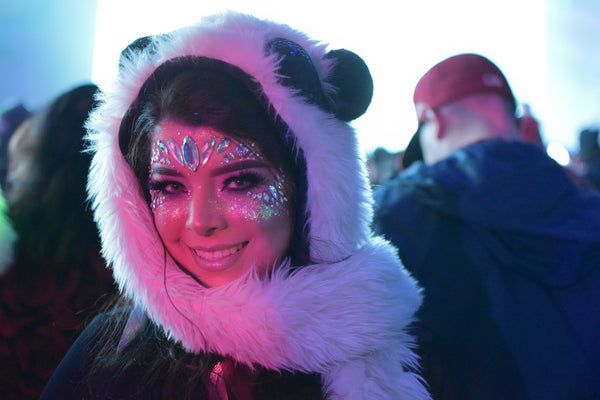 rave girl wearing panda hood and sparkly makeup