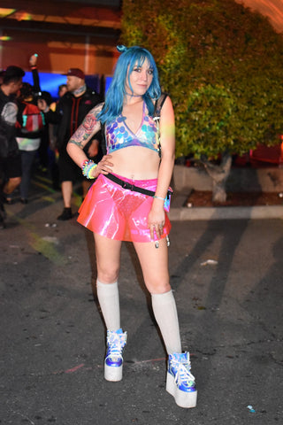 rave girl in colorful metallic outfit 