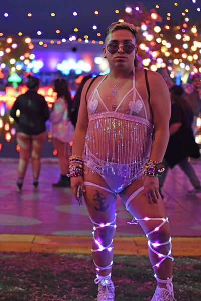 raver wearing pink strappy outfit