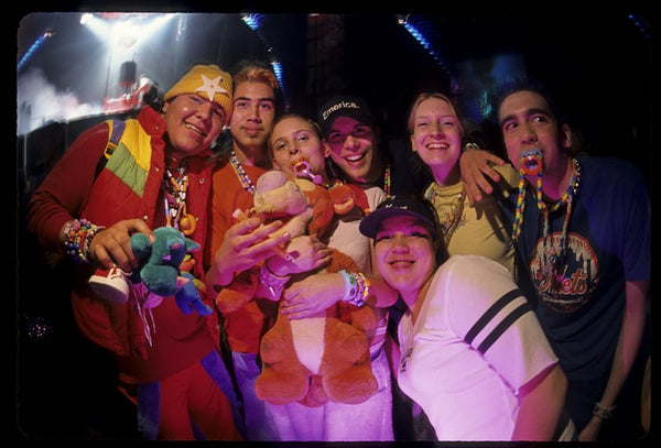 colorful rave group enjoying festival night life