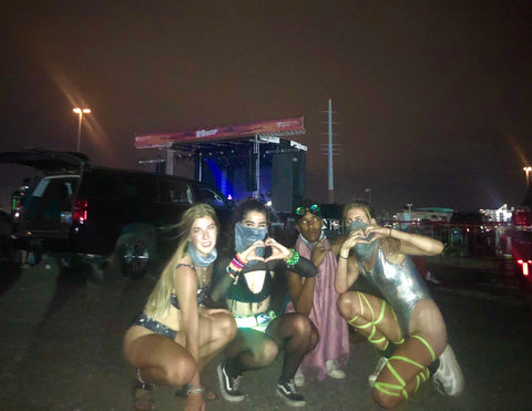 ravers making hearts at road rave