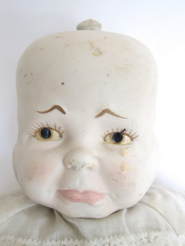 three face porcelain doll
